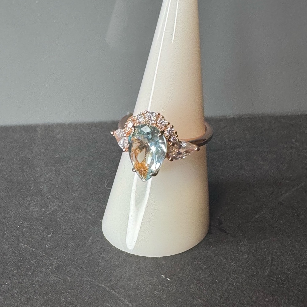 Elegant Rose Gold Plated and Lab Created Light Aquamarine Teardrop Ring